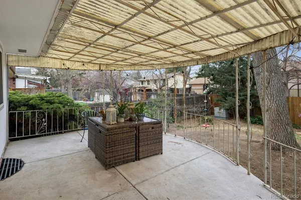 a outdoor space with lots of potted plants