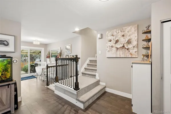 a view of entryway with workspace and stairs