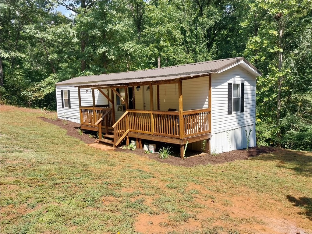 205 Lynden Loop Westminster, SC 29693 - Photo 2 of 16 featuring a covered front porch.