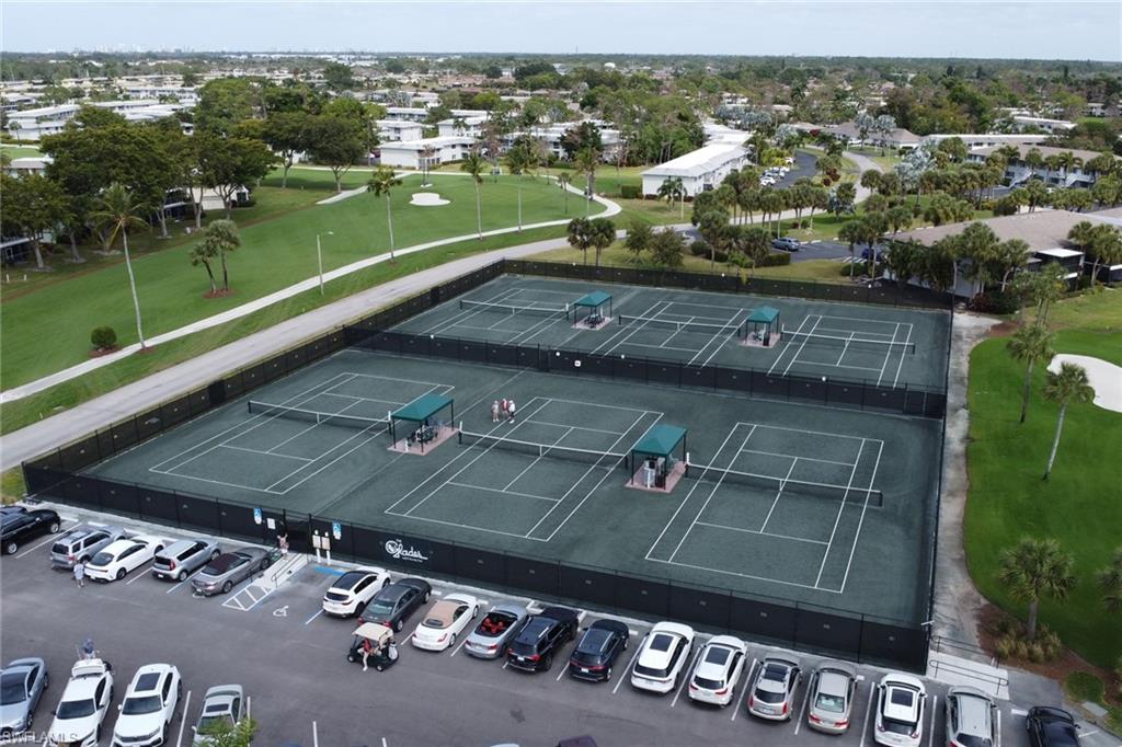 348 Tern Drive, Unit 4 Naples, FL 34112 - Photo 26 of 27 an aerial view of a parking space