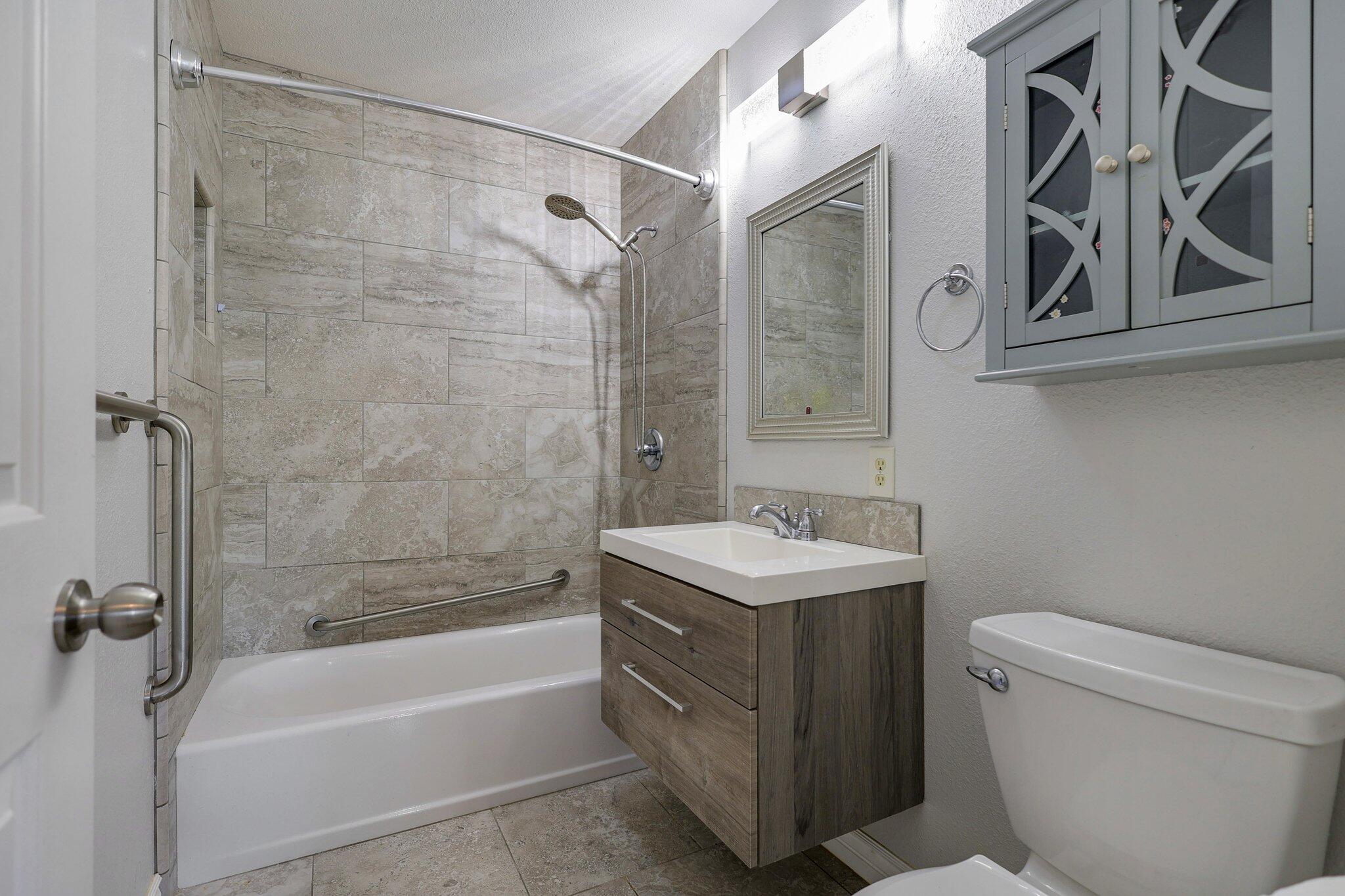 20727 Old Alturas Road Redding, CA 96003 - Photo 19 of 32 a bathroom with a sink a toilet and shower