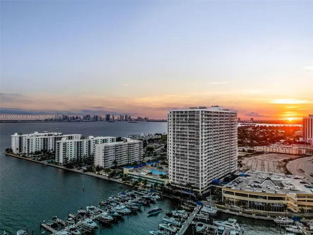 a view of a lake with a city