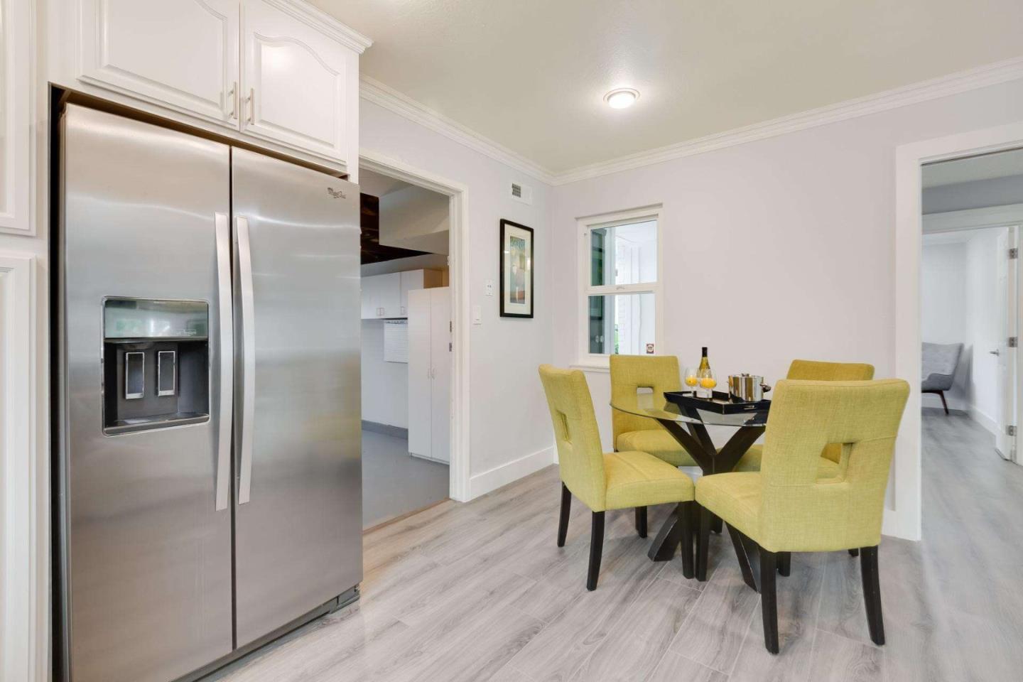 4258 Blue Ridge Street Fremont, CA 94536 - Photo 14 of 34 a view of a dining room with furniture and wooden floor