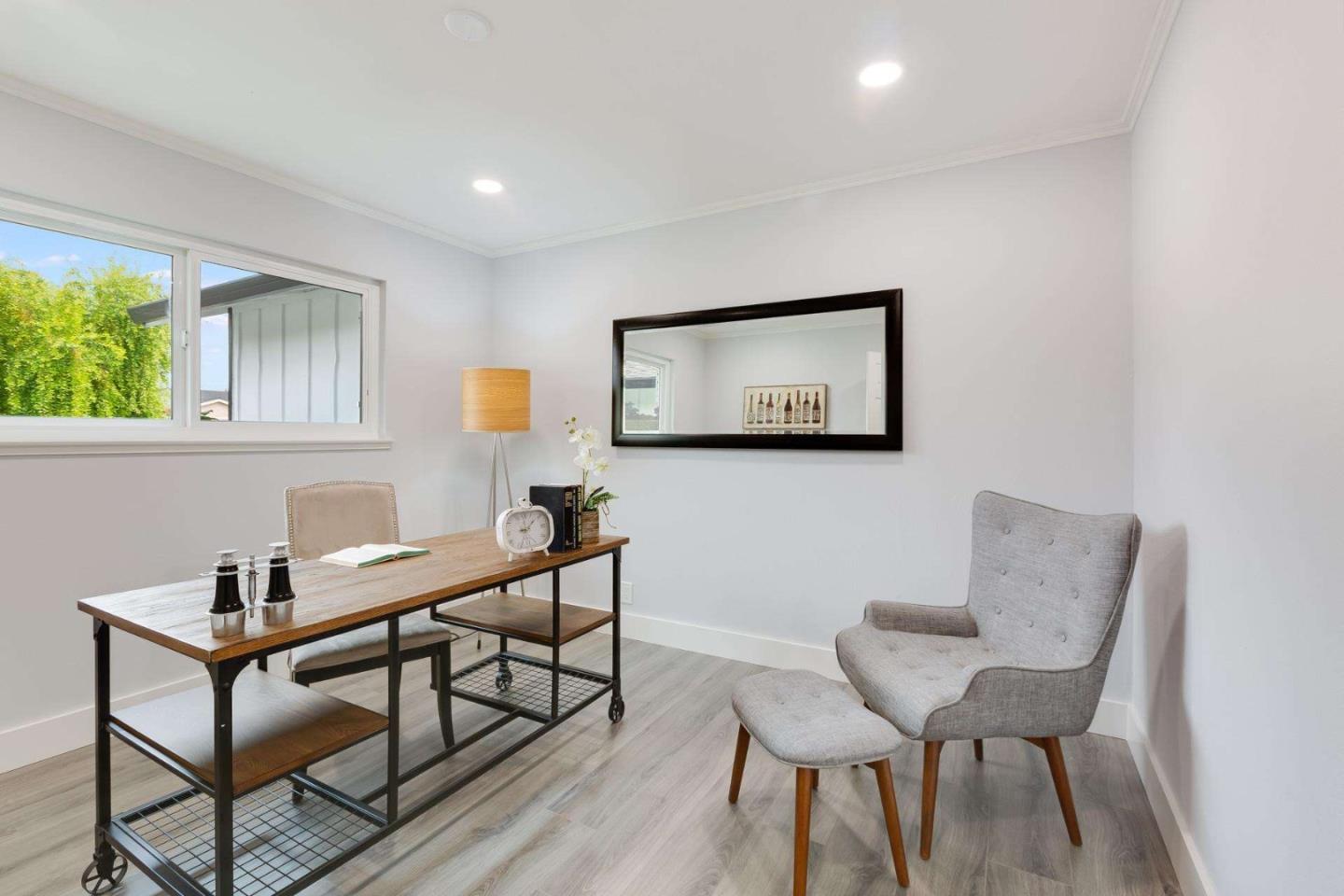 4258 Blue Ridge Street Fremont, CA 94536 - Photo 16 of 34 a view of a workspace with furniture and a potted plant