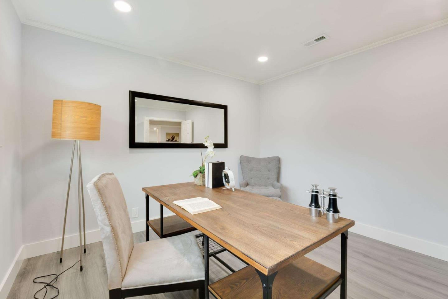 4258 Blue Ridge Street Fremont, CA 94536 - Photo 18 of 34 a view of a dining room with furniture and wooden floor