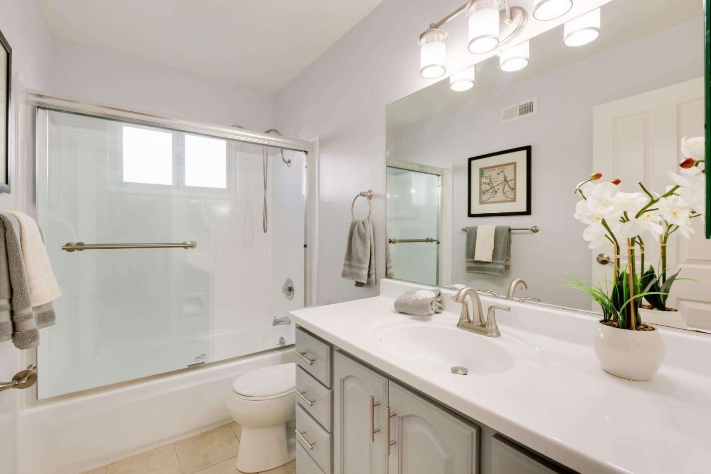 4258 Blue Ridge Street Fremont, CA 94536 - Photo 19 of 34 a bathroom with a sink a toilet and shower