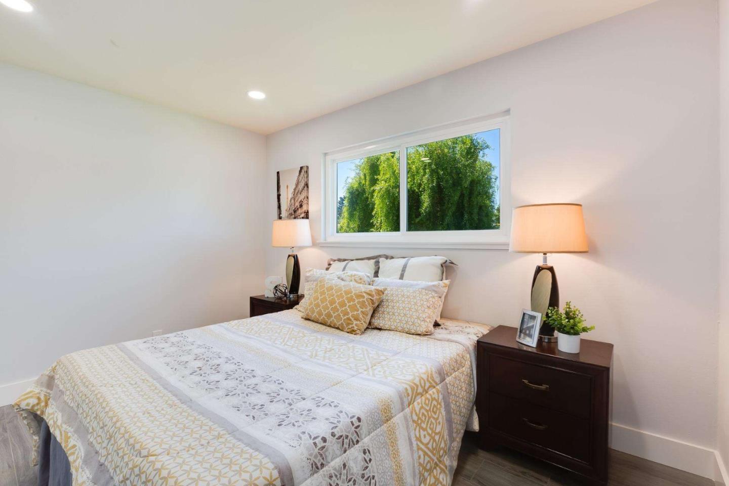 4258 Blue Ridge Street Fremont, CA 94536 - Photo 23 of 34 a bedroom with a bed and a window