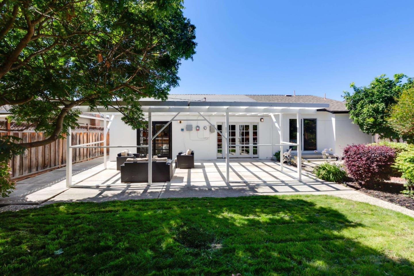 4258 Blue Ridge Street Fremont, CA 94536 - Photo 30 of 34 a view of a house with a patio and a yard
