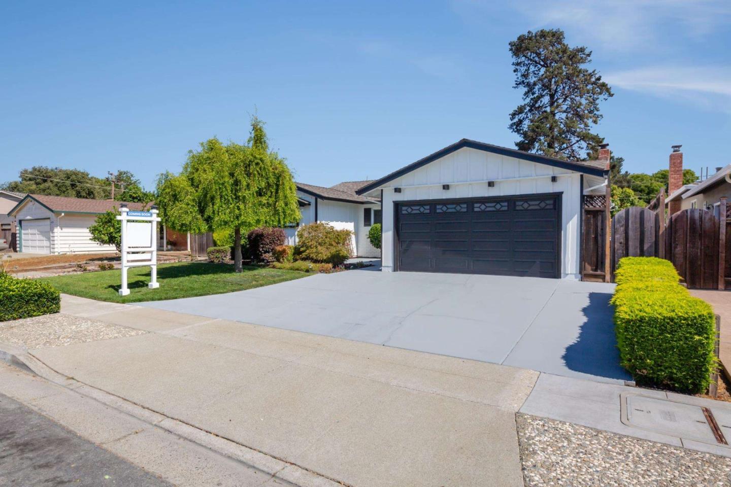 4258 Blue Ridge Street Fremont, CA 94536 - Photo 3 of 34 a front view of a house with garden