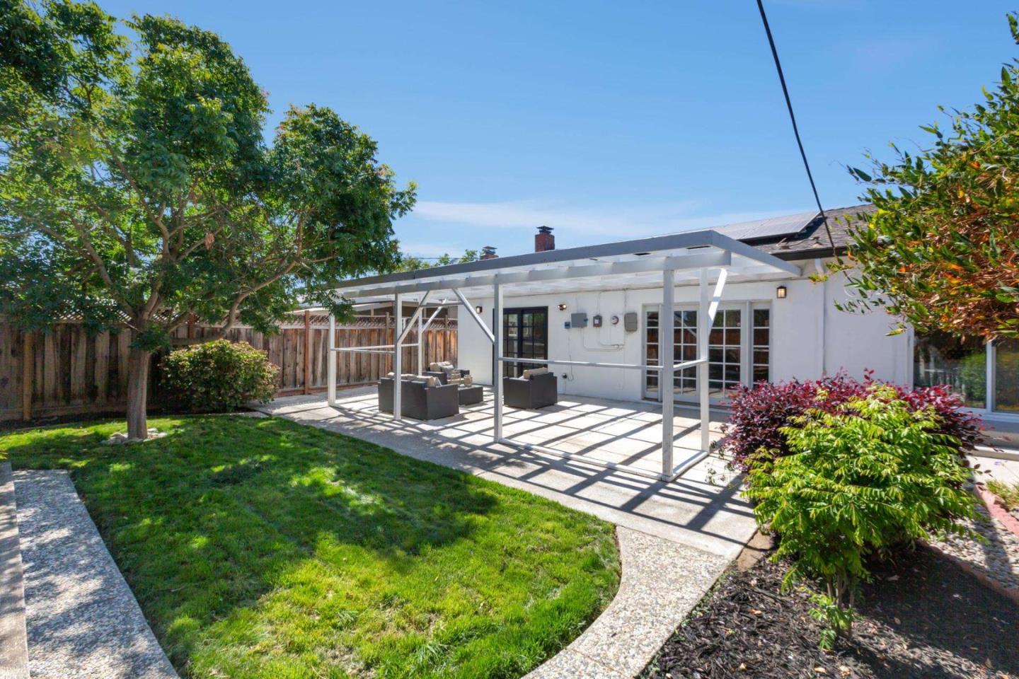 4258 Blue Ridge Street Fremont, CA 94536 - Photo 31 of 34 a view of a house with a yard and sitting area