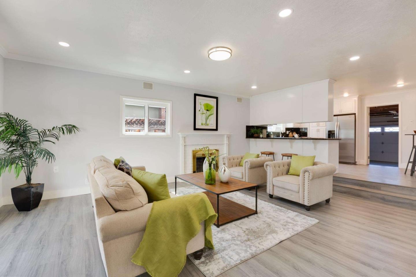 4258 Blue Ridge Street Fremont, CA 94536 - Photo 9 of 34 a living room with furniture and a wooden floor