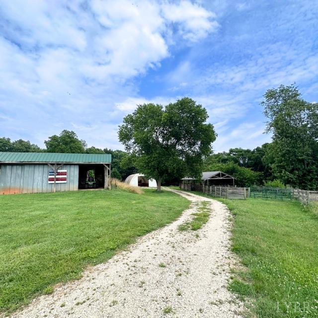3638 Spring Grove Road Spout Spring, VA 24522 - Photo 5 of 9 a house view with a garden space