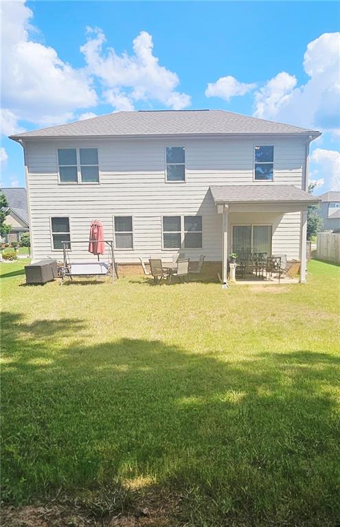 110 Halibut Circle Covington, GA 30016 - Photo 14 of 15 a view of house with a swimming pool