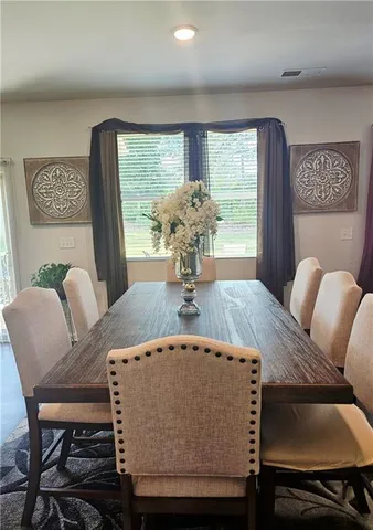 a living room with furniture and window