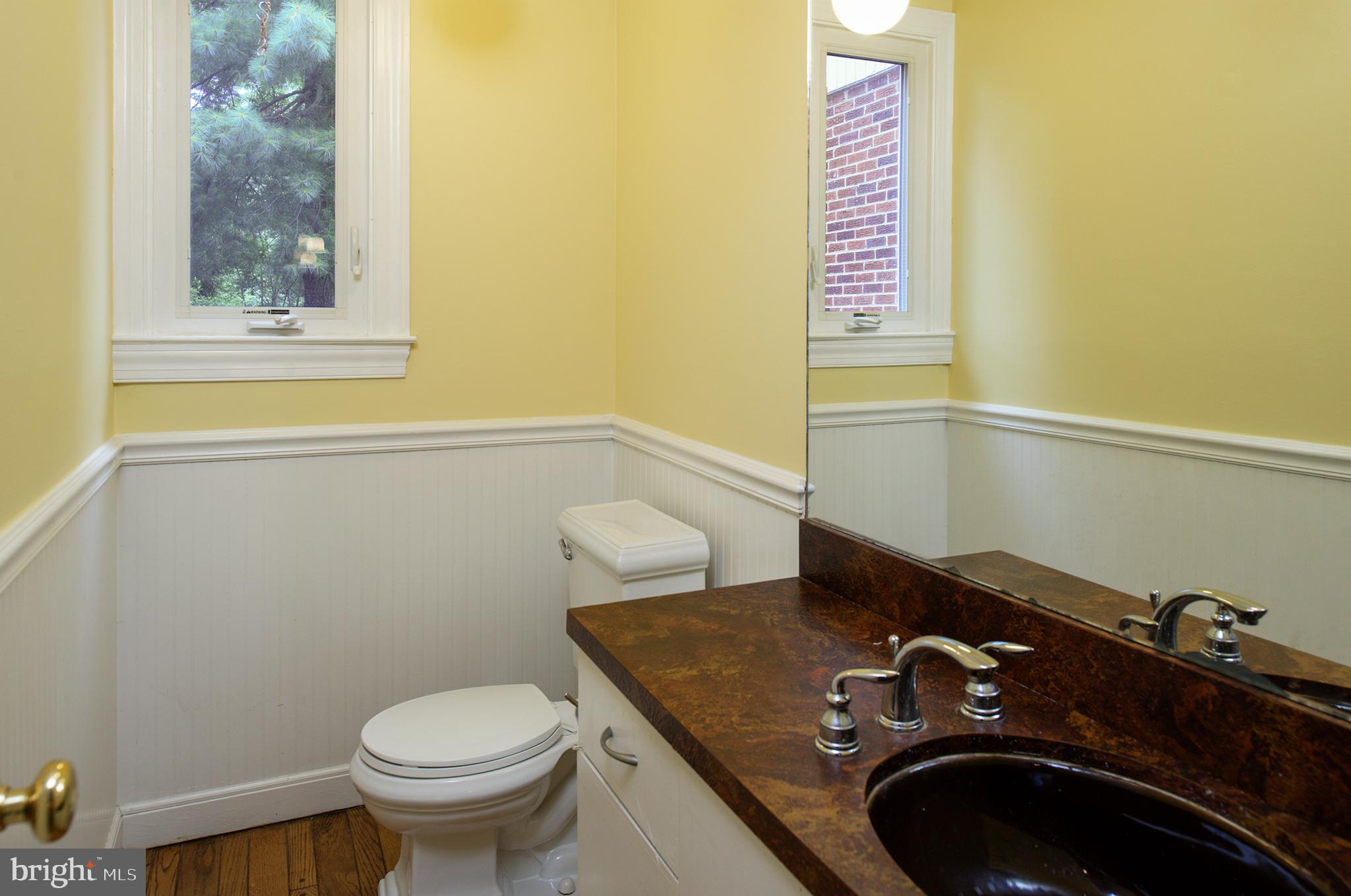 3128 Holmes Run Road Falls Church, VA 22042 - Photo 11 of 34 Powder room between kitchen and family room