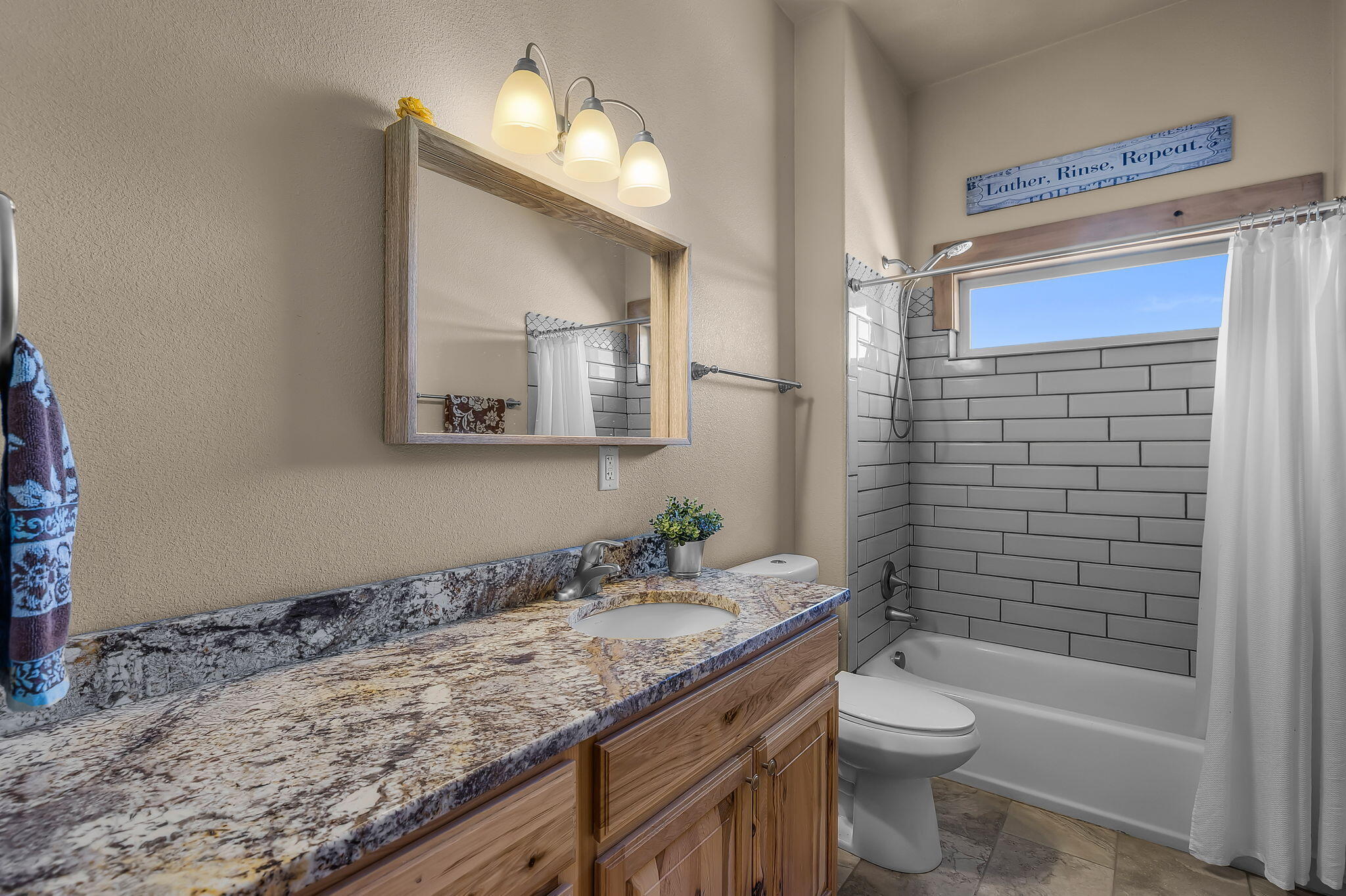 6040 Gravett Road Prineville, OR 97754 - Photo 26 of 77 a bathroom with a granite countertop sink toilet and shower