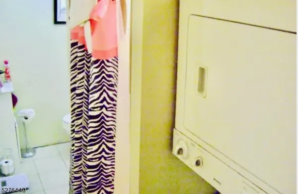 a bathroom with a sink and a shower