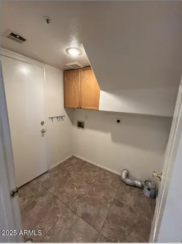 a view of a room with rack on the wall