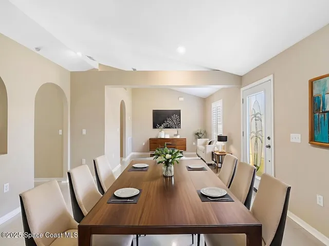 a view of a dining room with furniture