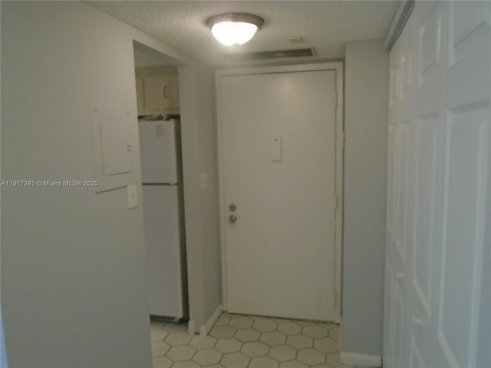 7051 Environ Boulevard, Unit 136 Lauderhill, FL 33319 - Photo 15 of 23 a bathroom with a glass door shower