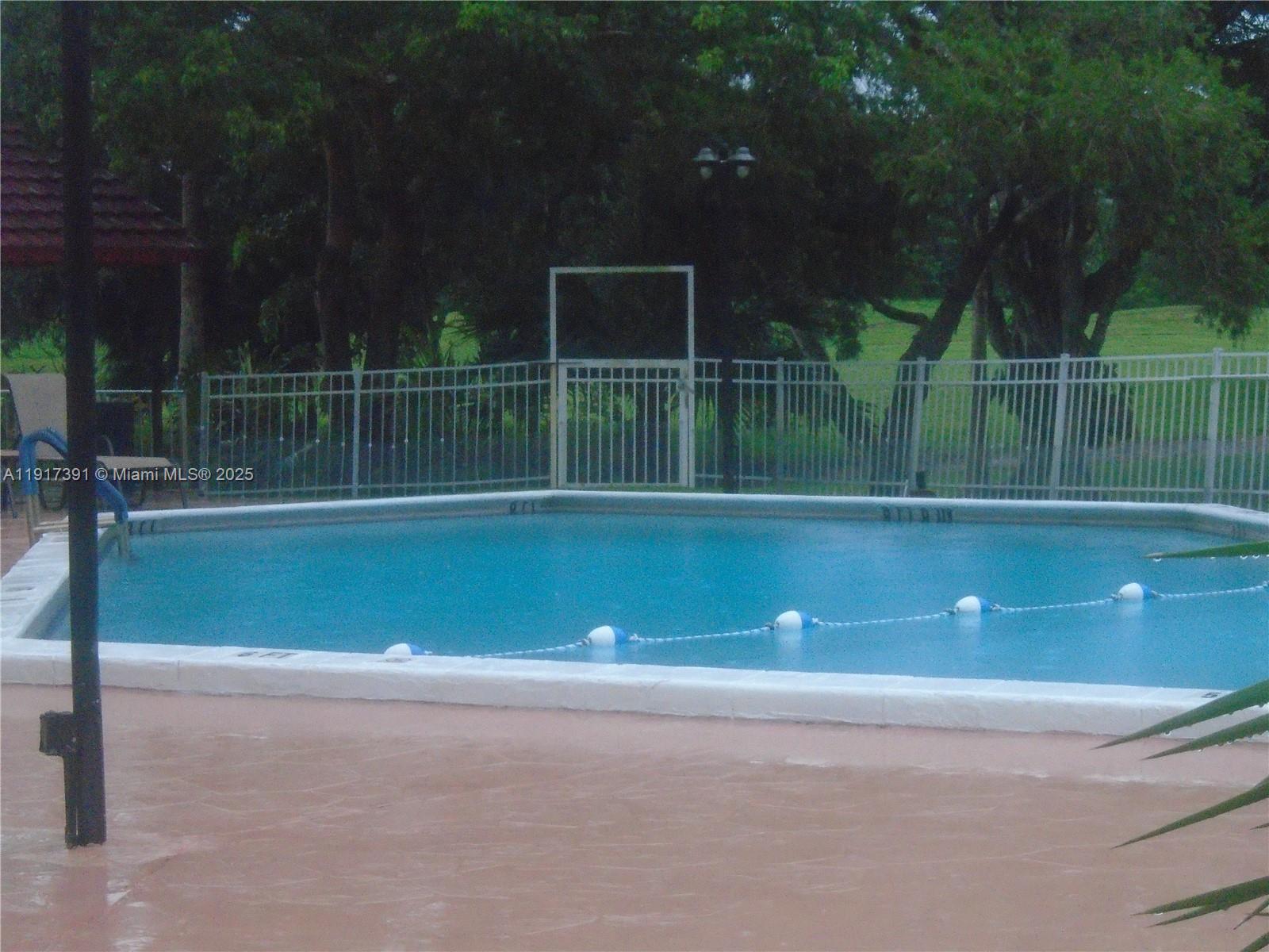 7051 Environ Boulevard, Unit 136 Lauderhill, FL 33319 - Photo 5 of 23 a view of outdoor space