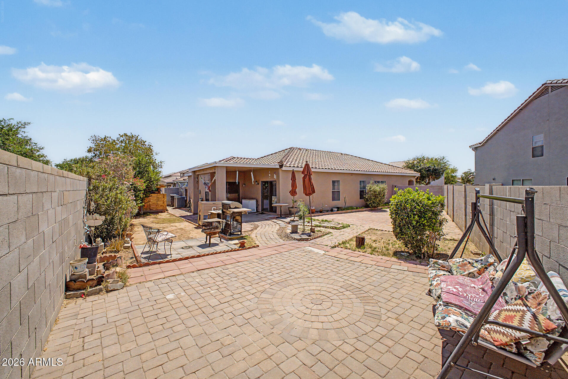9730 West Payson Road Tolleson, AZ 85353 - Photo 29 of 57 a view of a house with sitting area and furniture