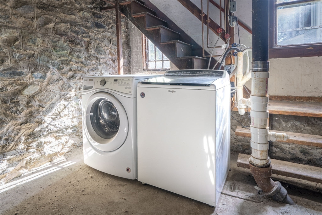 166 Elliot Street, Unit 2 Newton, MA 02464 - Photo 20 of 20 a utility room with dryer and washer
