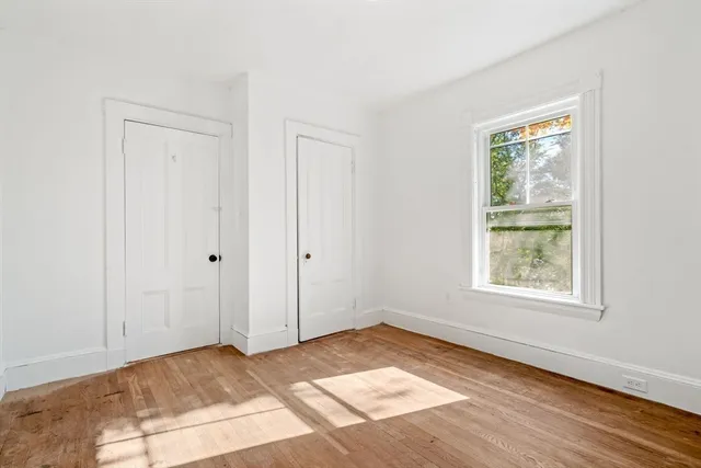 a view of an empty room and window