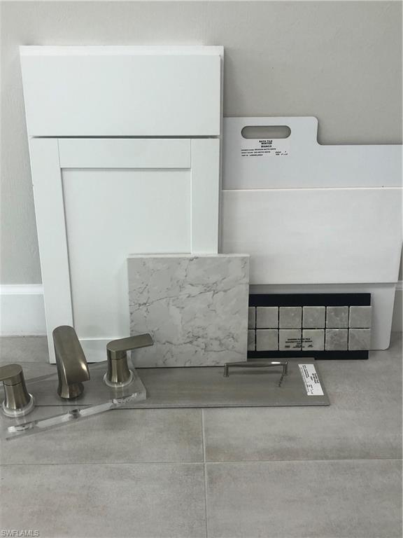 20155 Napa Loop Estero, FL 33928 - Photo 4 of 35 a view of storage and utility room with two washing machine