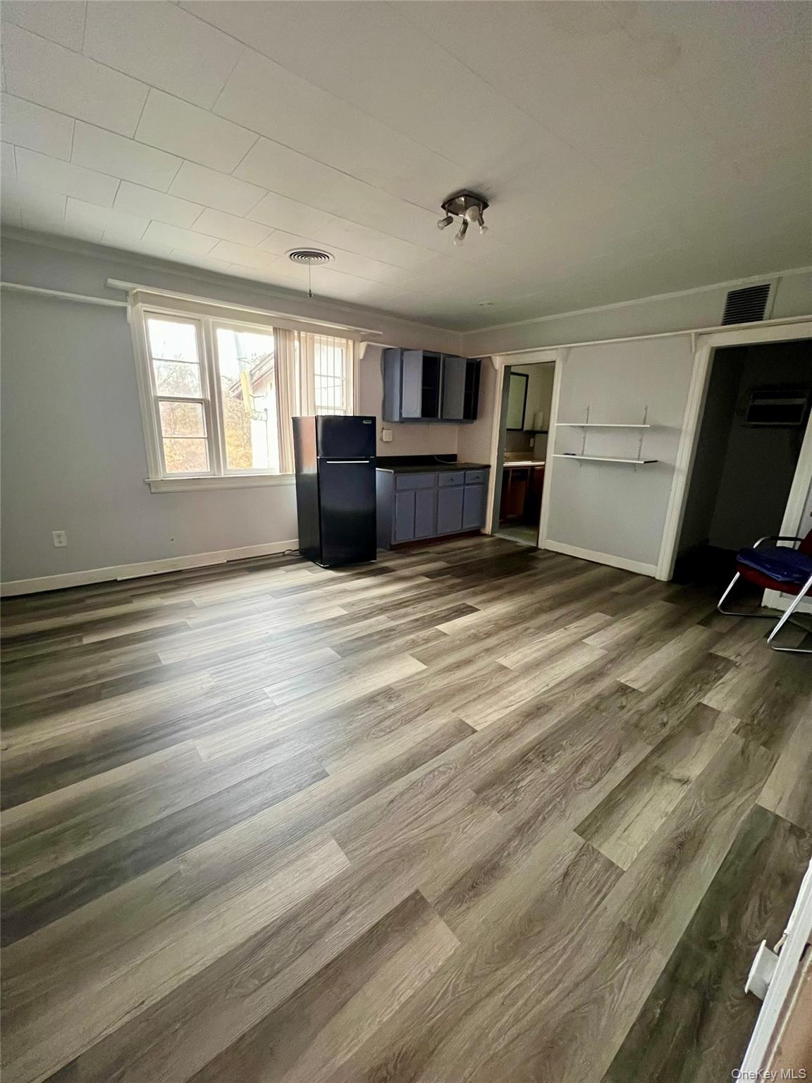 1612-1616 Rte 9W, Unit 20 Milton, NY 12547 - Photo 2 of 5 a view of an empty room with a window