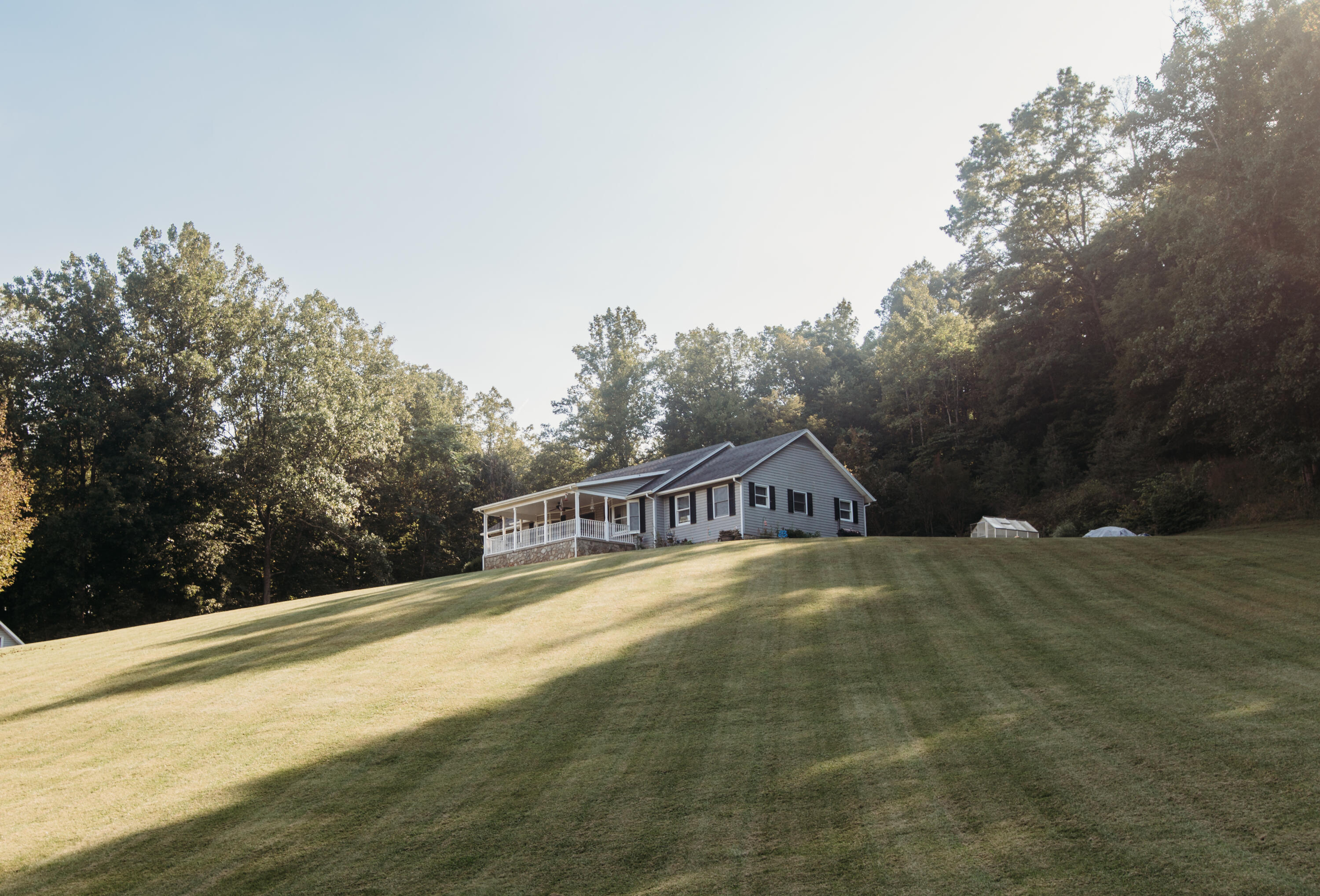 3197 Lee Elgin Road Woolwine, VA 24185 - Photo 10 of 46 a view of an ocean with a house in the background