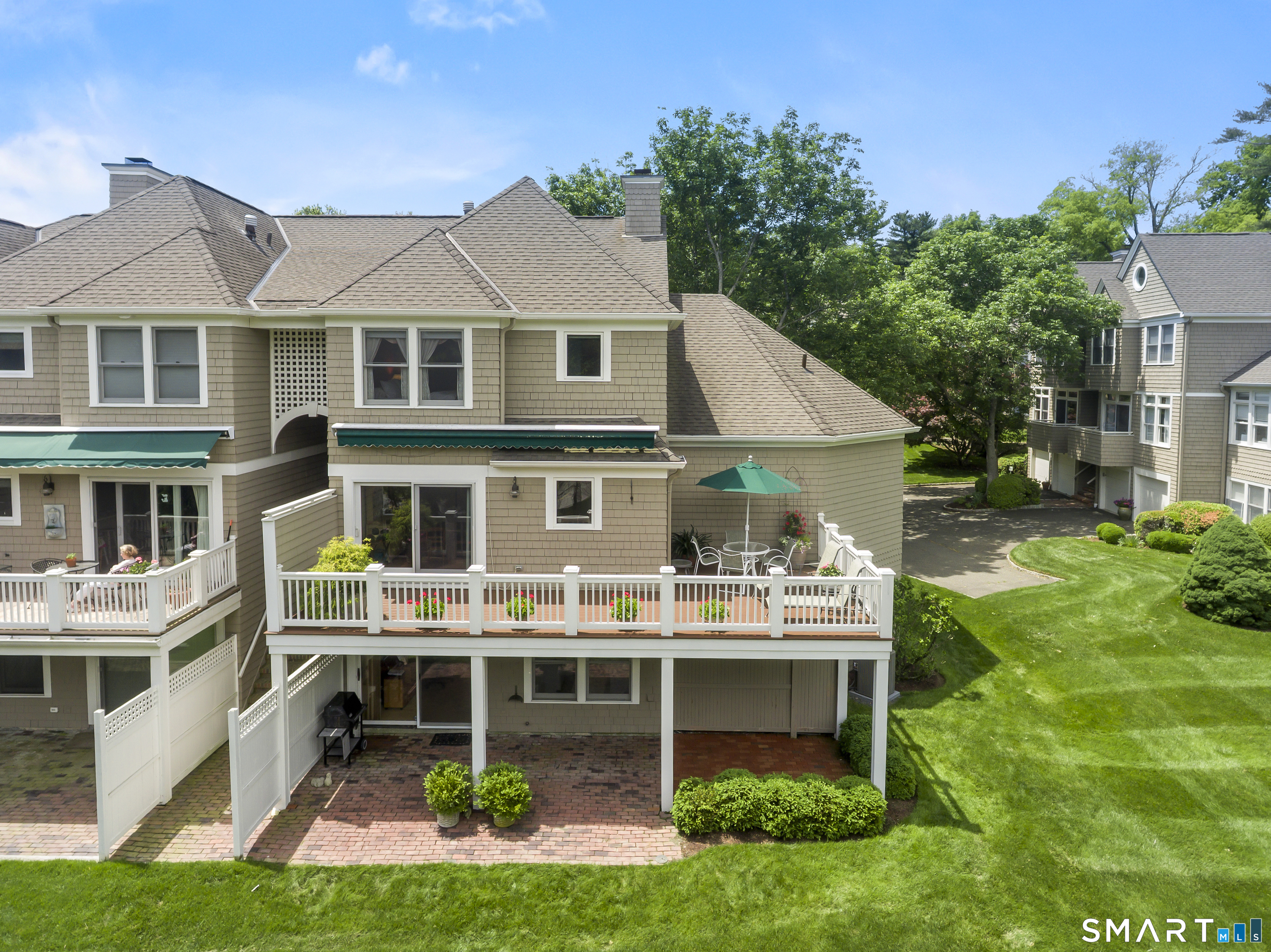 936 South Pine Creek Road Fairfield, CT 06824 - Photo 2 of 39 Private end unit with wrap around deck and spacious yard.