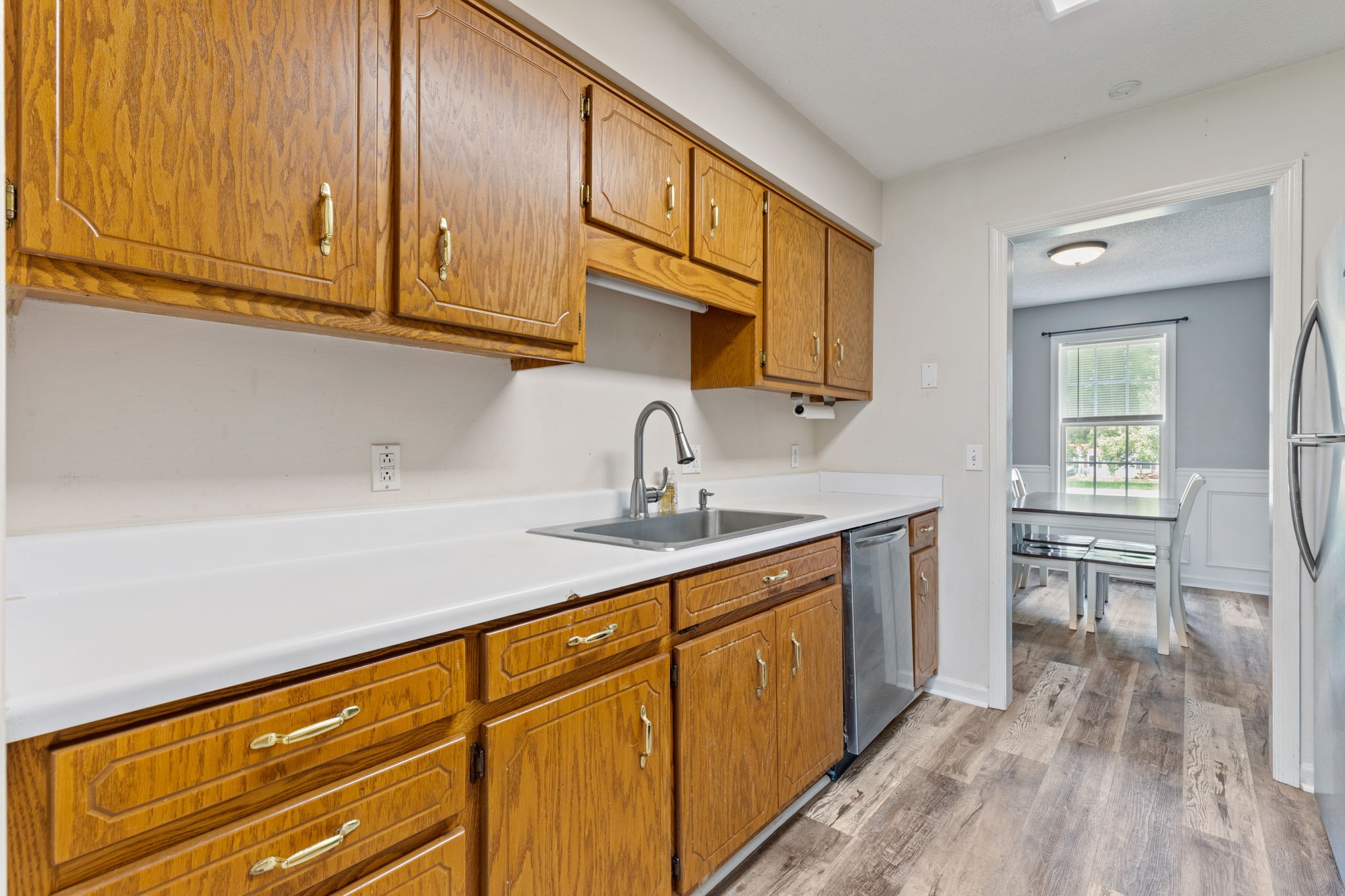 889 6 Mile Board Road Belvidere, TN 37306 - Photo 12 of 27 a kitchen with stainless steel appliances granite countertop a sink and cabinets