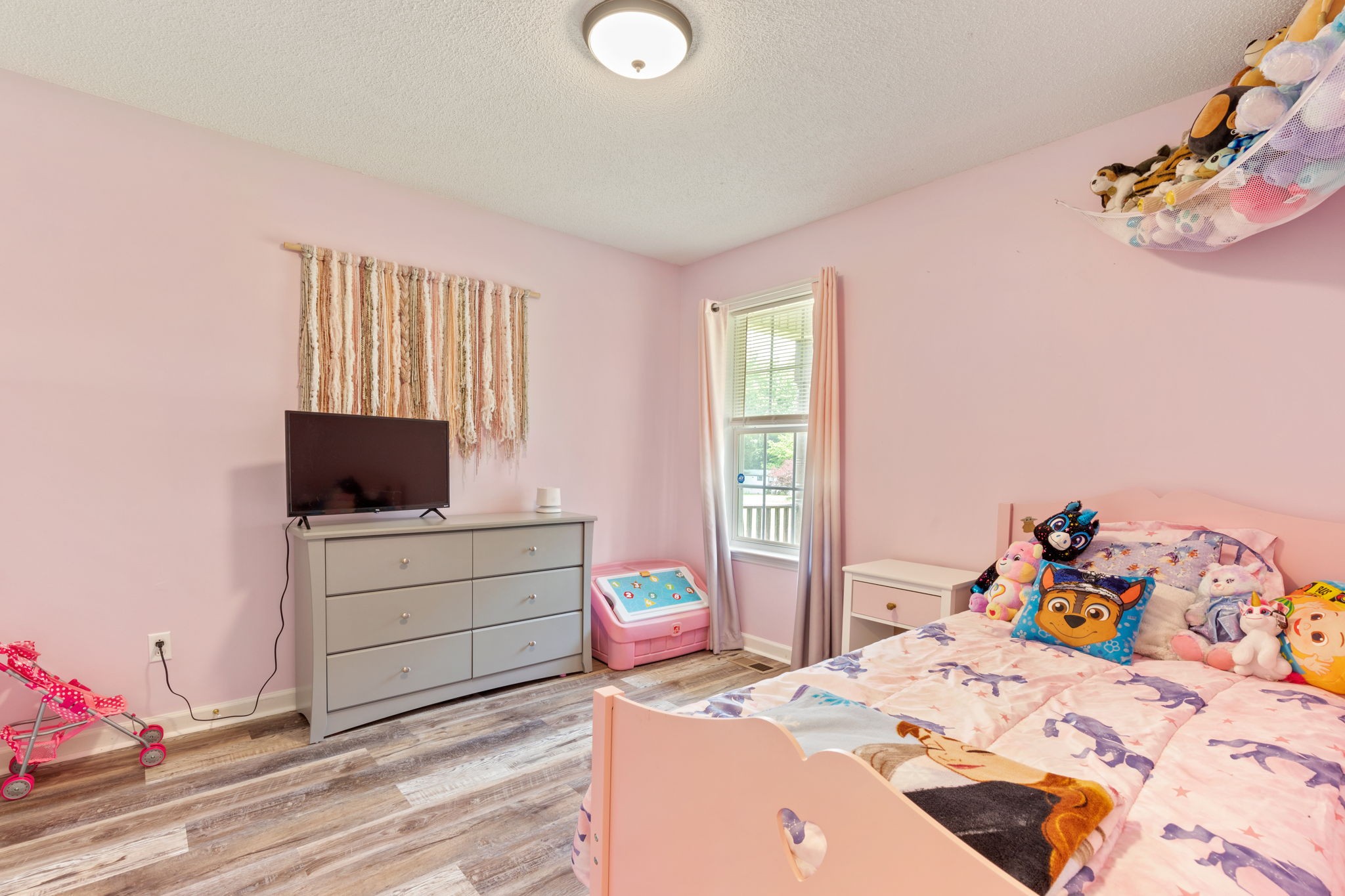 889 6 Mile Board Road Belvidere, TN 37306 - Photo 24 of 27 a bedroom with a bed and a window