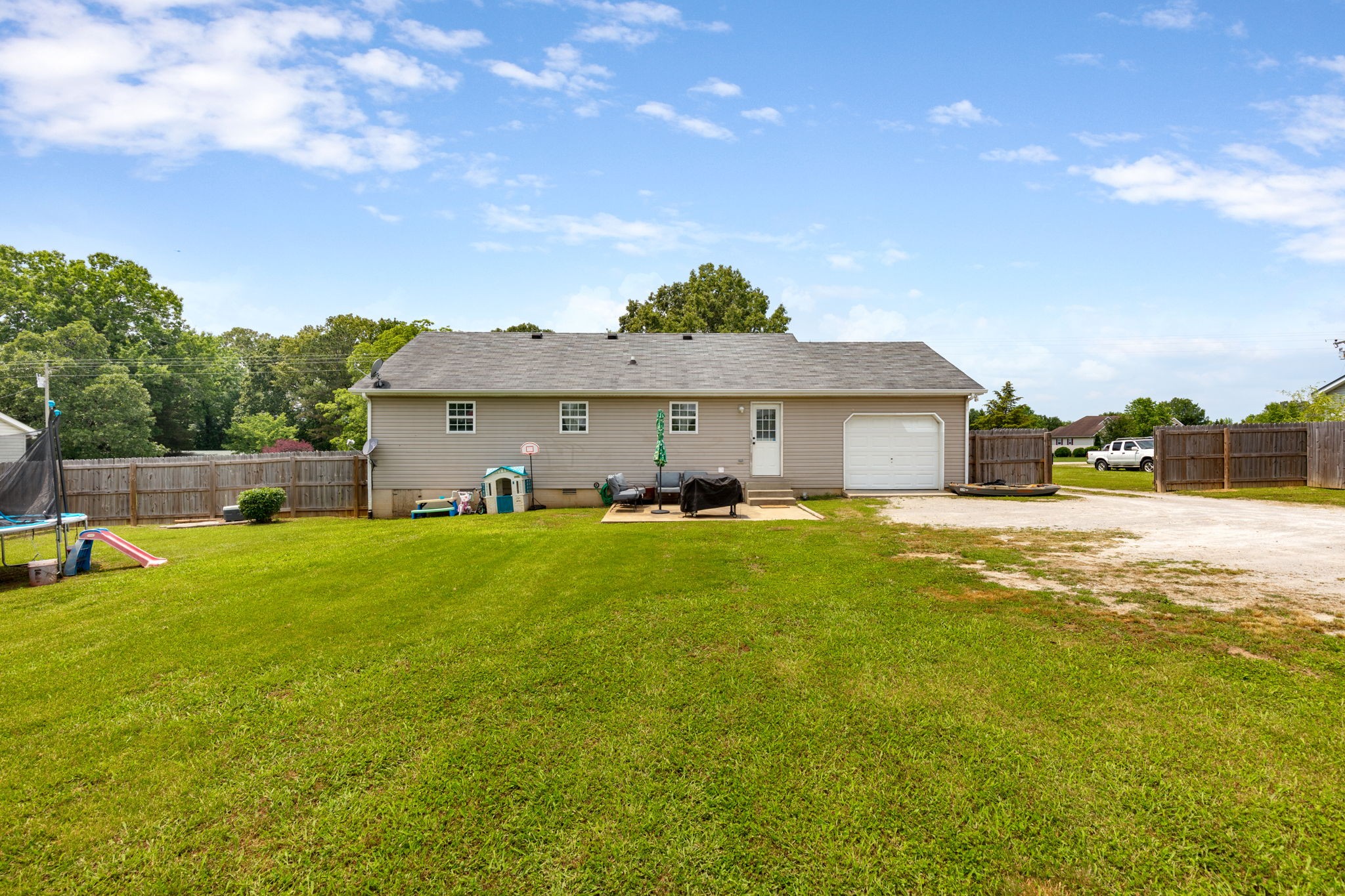 889 6 Mile Board Road Belvidere, TN 37306 - Photo 27 of 27 a front view of a house with a garden and yard