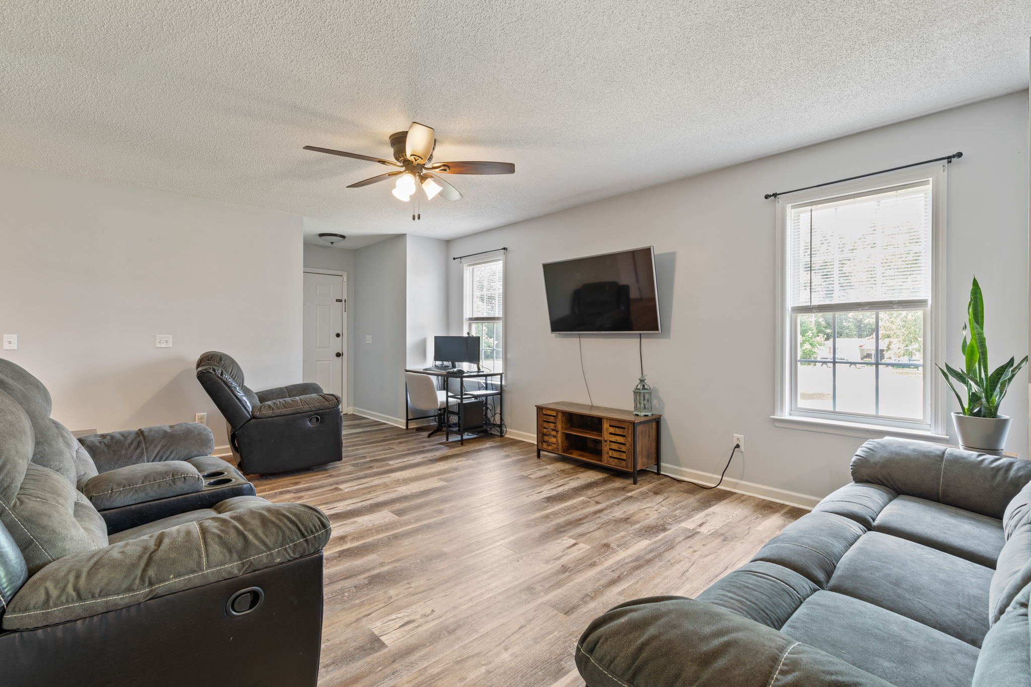 889 6 Mile Board Road Belvidere, TN 37306 - Photo 6 of 27 a living room with furniture and a flat screen tv