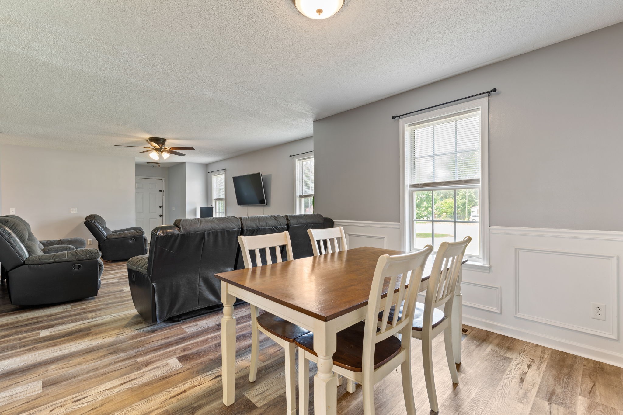 889 6 Mile Board Road Belvidere, TN 37306 - Photo 7 of 27 a view of a dining room with furniture and wooden floor