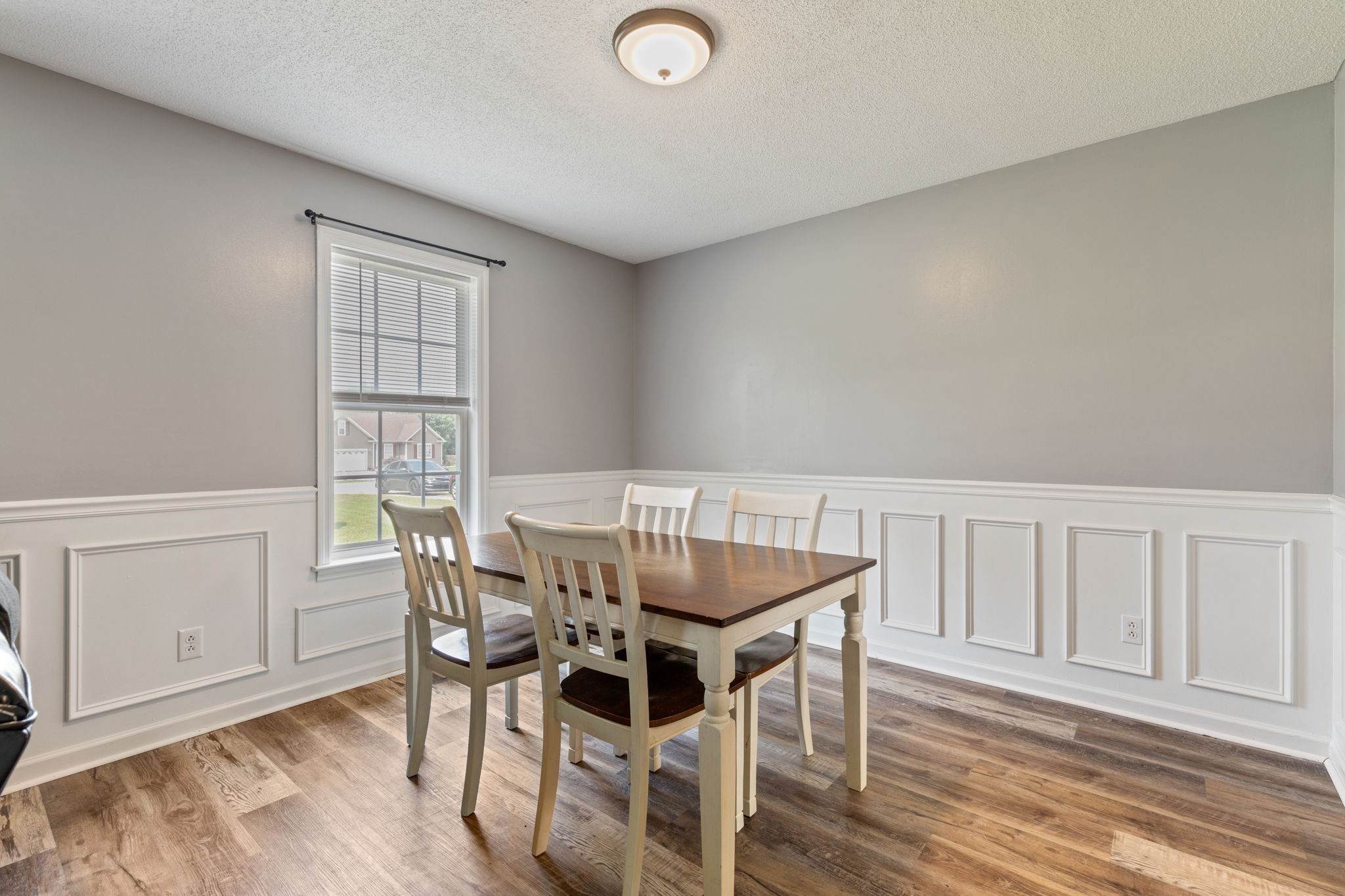 889 6 Mile Board Road Belvidere, TN 37306 - Photo 9 of 27 a view of a dining room with furniture and wooden floor