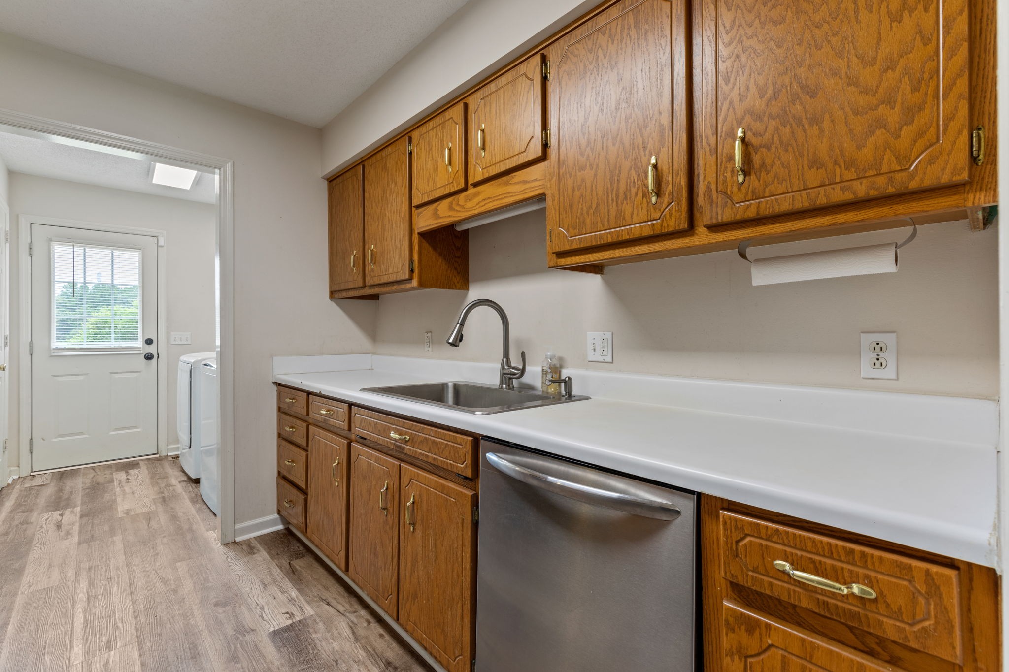 889 6 Mile Board Road Belvidere, TN 37306 - Photo 10 of 27 a kitchen with stainless steel appliances granite countertop a sink a stove and cabinets