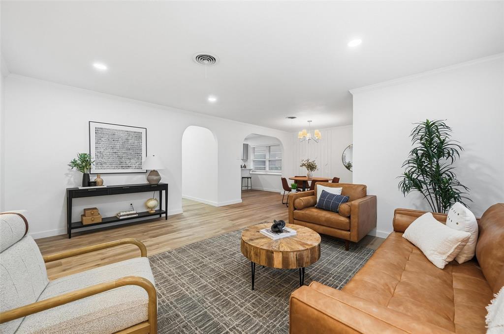 816 Green Cove Lane Dallas, TX 75232 - Photo 1 of 24 a living room with furniture and a couch