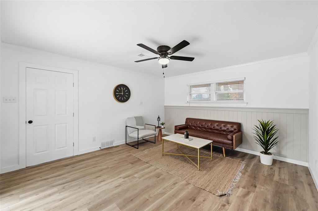 816 Green Cove Lane Dallas, TX 75232 - Photo 13 of 24 a bedroom with furniture and a window