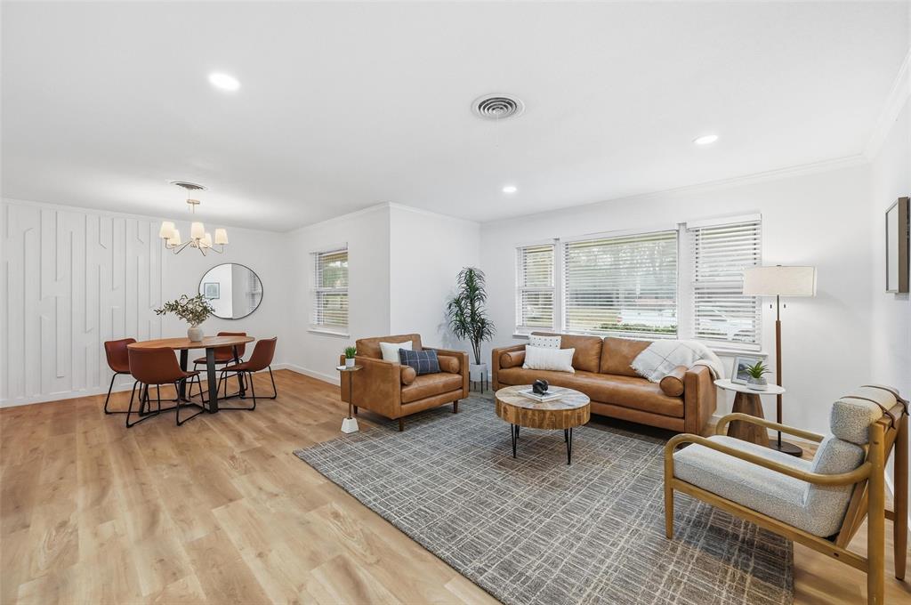 816 Green Cove Lane Dallas, TX 75232 - Photo 2 of 24 a living room with furniture and a table