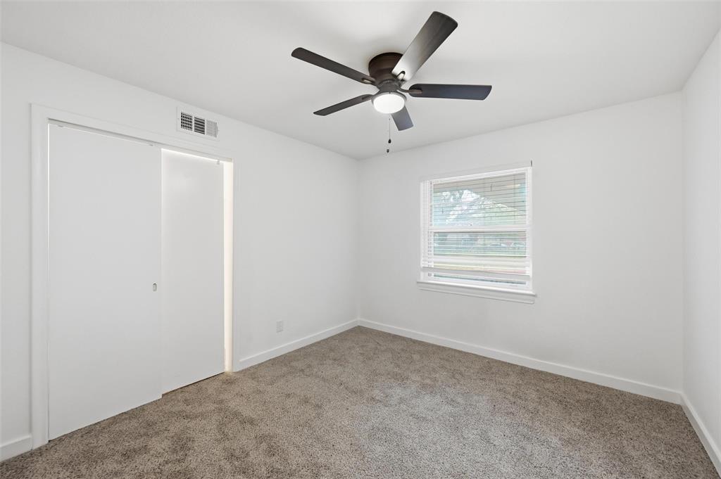 816 Green Cove Lane Dallas, TX 75232 - Photo 21 of 24 a view of a ceiling fan with a ceiling fan