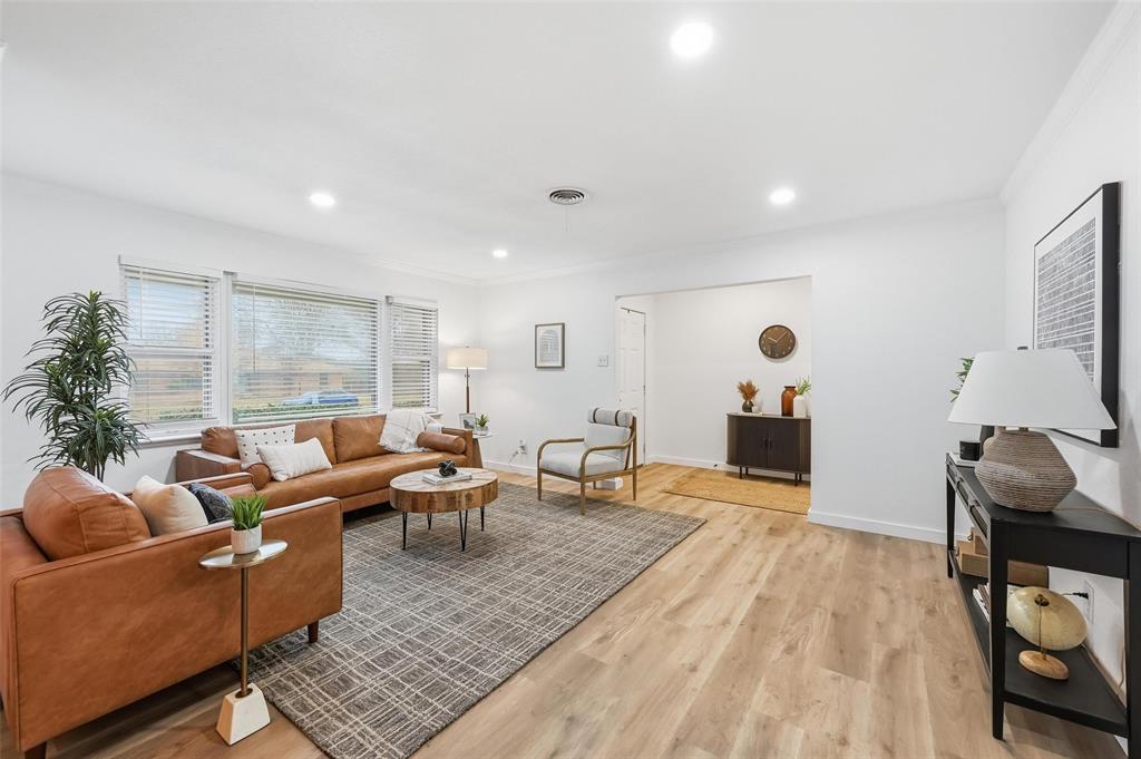 816 Green Cove Lane Dallas, TX 75232 - Photo 8 of 24 a living room with furniture and wooden floor