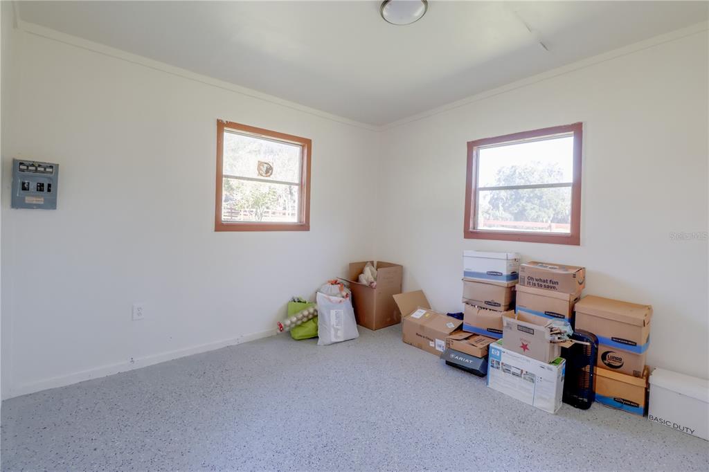 1480 Northeast 97th St Road Anthony, FL 32617 - Photo 23 of 35 a room with toys and a window