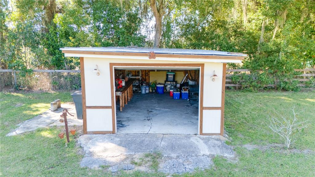 1480 Northeast 97th St Road Anthony, FL 32617 - Photo 25 of 35 a view of a porch with furniture and a yard