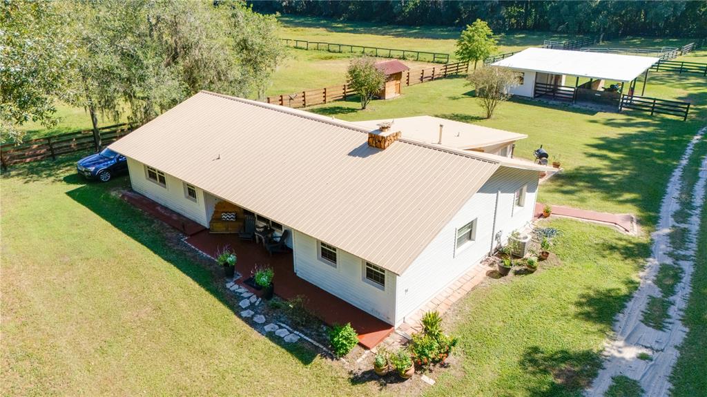 1480 Northeast 97th St Road Anthony, FL 32617 - Photo 34 of 35 a view of a house with a yard