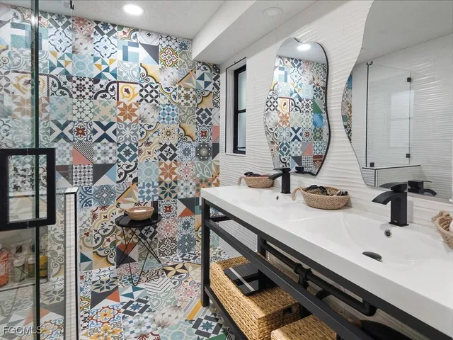 a bathroom with a sink and a mirror