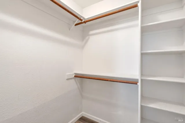 a bathroom with a shower and a toilet