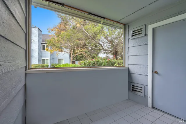a view of balcony and workspace